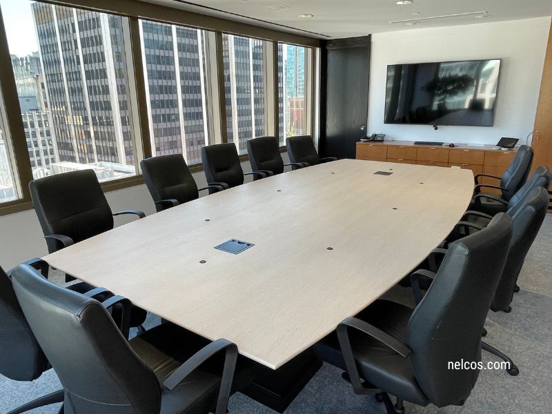 Boardroom table wrapped with SPW43 Oak interior film pattern