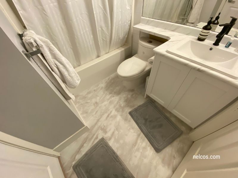 Bathroom renovation with interior film - cabinet, vanity, floor